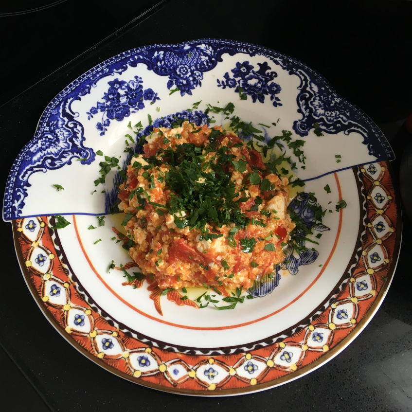 A plate with food on it
Description automatically generated